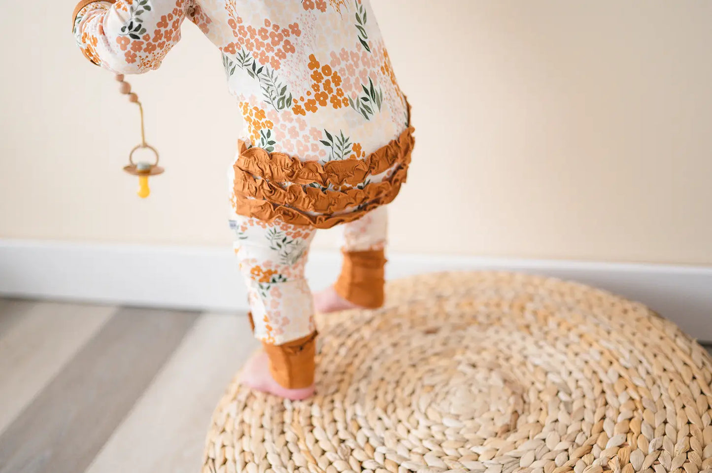 front ruffle romper back