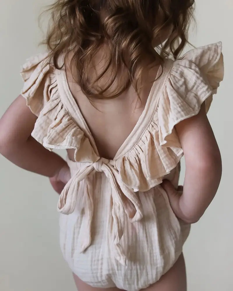 model wearing ruffle top