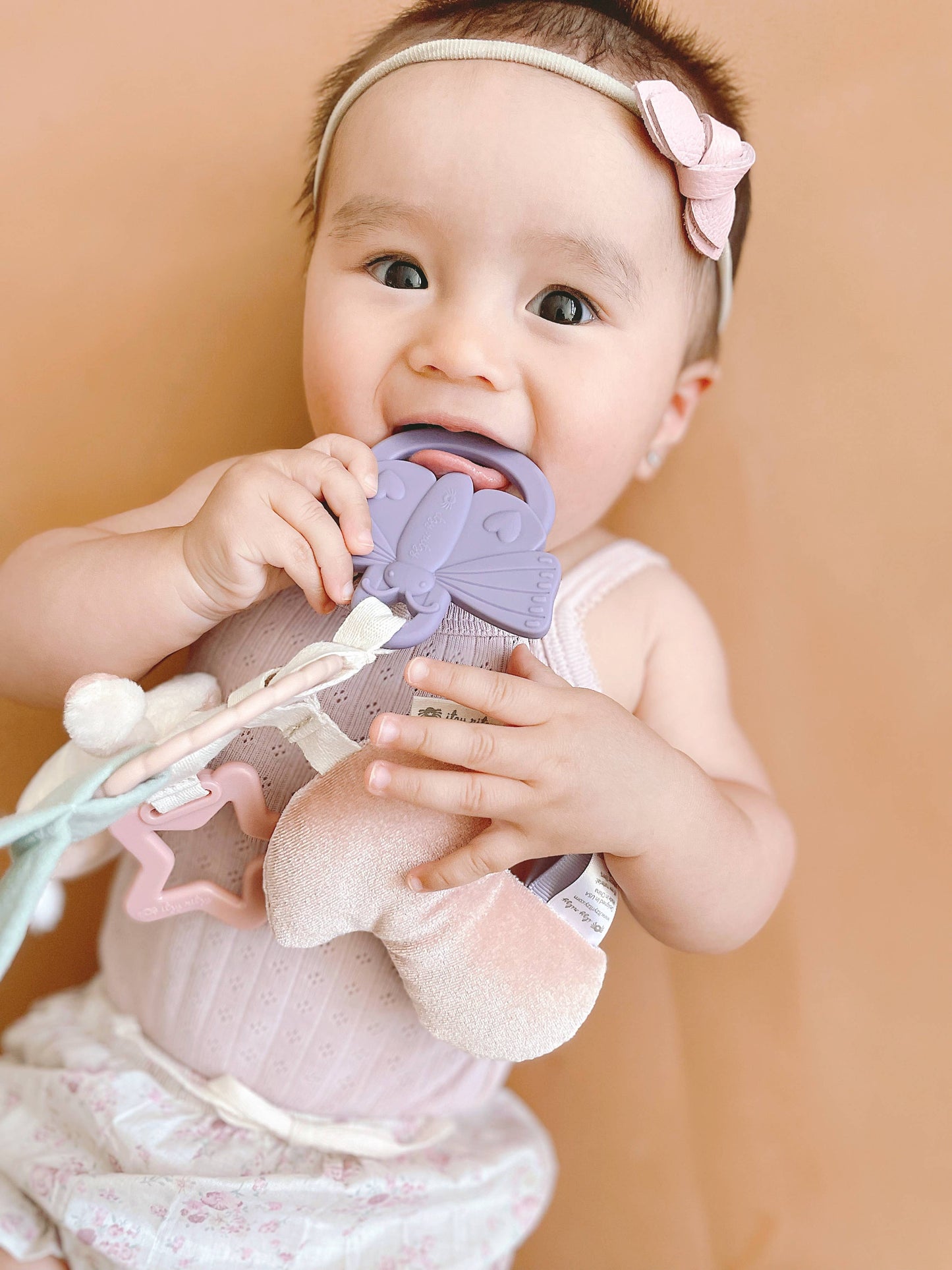 Bitzy Busy Ring™ Teething Activity Toy: Rainbow