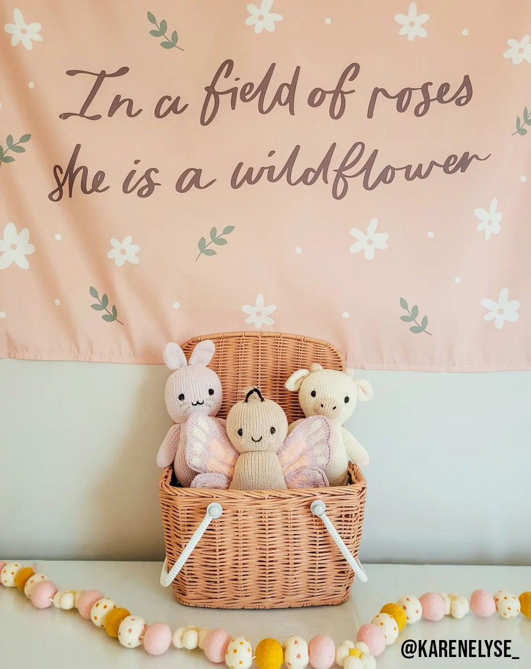 In A Field of Roses She Is A Wildflower Banner: Small 17x13"