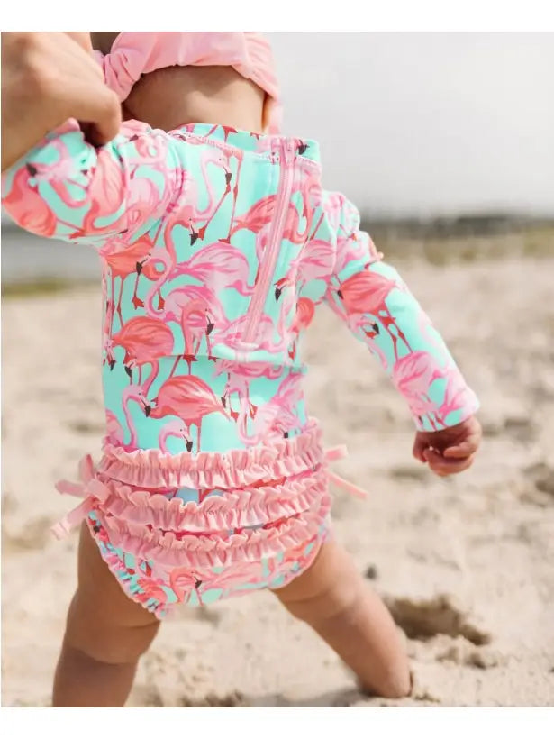 child wearing flamingo designed swimwear 