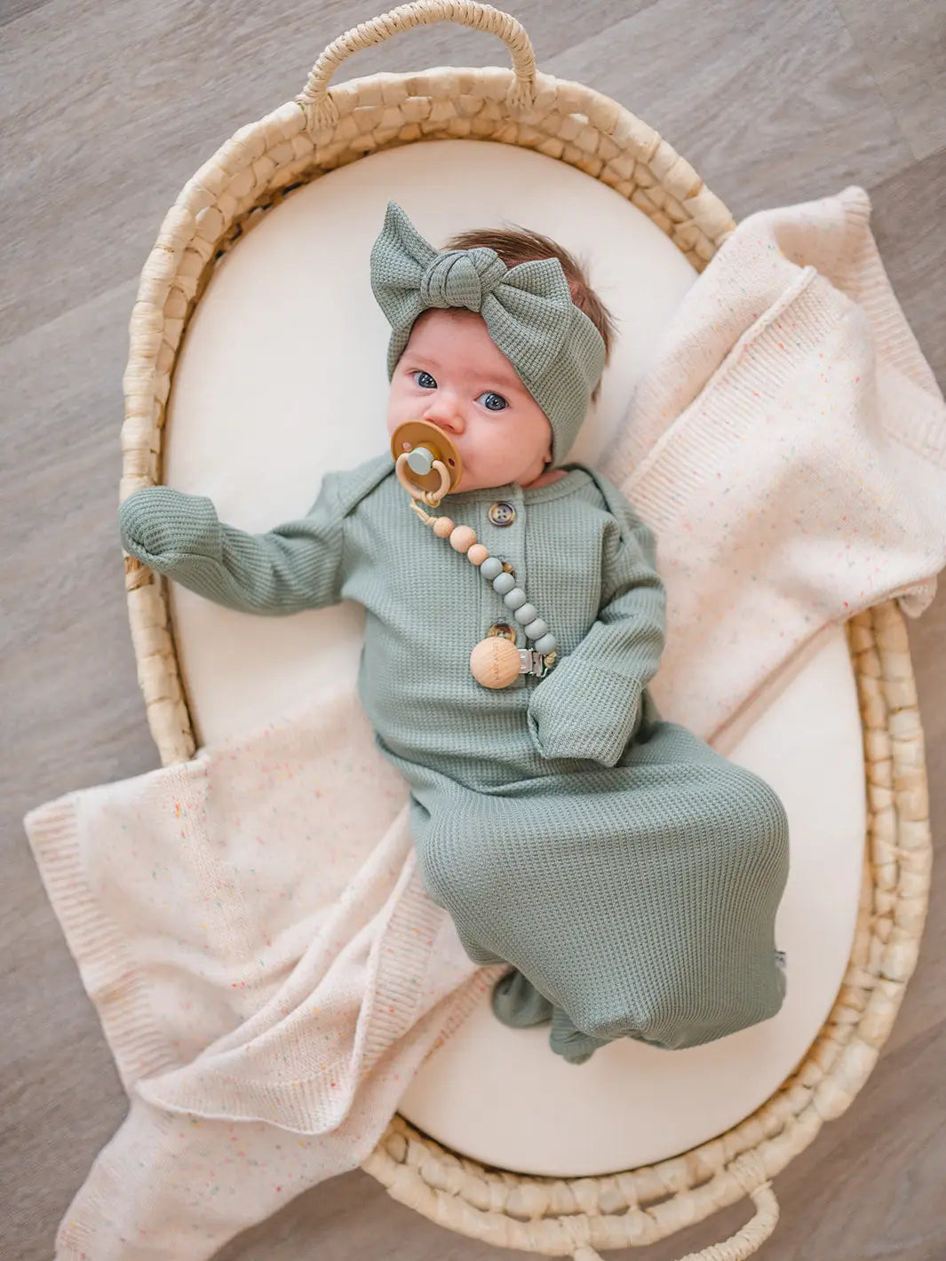 baby wearing waffle gown 